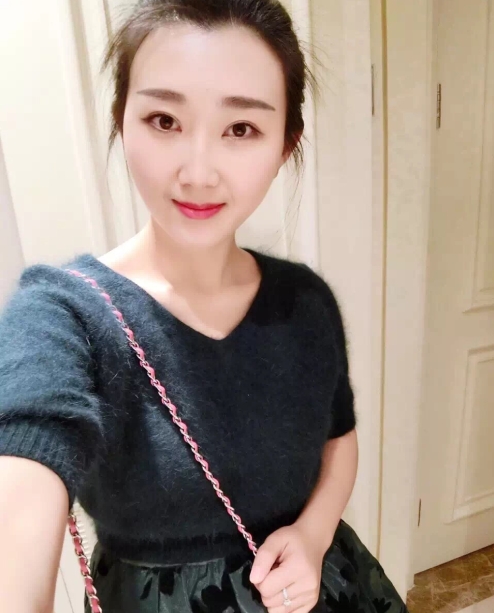 小妮的第三张照片--光泽婚介网